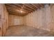 Unfinished basement with exposed ceiling, studded walls, and concrete flooring at 6861 Ga Hwy 5, Douglasville, GA 30135