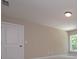 Neutral colored bedroom with a window letting in natural light at 6861 Ga Hwy 5, Douglasville, GA 30135