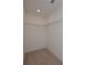 Walk-in closet with carpet and wire shelving at 6861 Ga Hwy 5, Douglasville, GA 30135