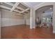 Dining room with hardwood floors, wainscoting, and modern chandelier at 6861 Ga Hwy 5, Douglasville, GA 30135