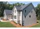 View of a two-story home showing the architectural details and landscaping at 6861 Ga Hwy 5, Douglasville, GA 30135