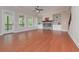 Spacious living room featuring hardwood floors, fireplace, and abundant natural light at 6861 Ga Hwy 5, Douglasville, GA 30135