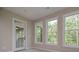 Bright living room with natural light and access to a screened-in porch at 6861 Ga Hwy 5, Douglasville, GA 30135