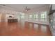 Open-concept living room with hardwood floors, fireplace, and access to the kitchen at 6861 Ga Hwy 5, Douglasville, GA 30135