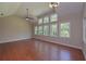 Vaulted ceiling above hardwood floor and wall of windows providing lots of natural light at 6861 Ga Hwy 5, Douglasville, GA 30135