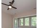 Living room featuring a ceiling fan and bright windows offering lots of natural light at 6861 Ga Hwy 5, Douglasville, GA 30135