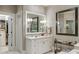 Stylish bathroom featuring a vanity with marble countertop and modern fixtures at 1 Brookhaven Ne Dr # 205, Atlanta, GA 30319
