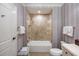 Elegant bathroom showcasing tub and separate shower accented with stylish wallpaper and fixtures at 1 Brookhaven Ne Dr # 205, Atlanta, GA 30319