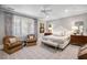Serene bedroom with plush bedding, window, and sophisticated decor, creating a relaxing retreat at 1 Brookhaven Ne Dr # 205, Atlanta, GA 30319
