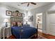 Comfortable bedroom featuring hardwood floors and an en-suite bathroom at 1 Brookhaven Ne Dr # 205, Atlanta, GA 30319