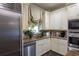 Well-appointed kitchen with stainless steel appliances, granite countertops, and ample cabinet space at 1 Brookhaven Ne Dr # 205, Atlanta, GA 30319
