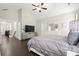 Bright bedroom features a vaulted ceiling and access to the second-floor landing at 1620 Brook Ivy Dr, Lawrenceville, GA 30044