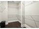 Walk-in closet with custom shelving, providing ample storage space at 1620 Brook Ivy Dr, Lawrenceville, GA 30044