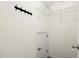 Walk-in closet with a door and upper metal shelving at 1620 Brook Ivy Dr, Lawrenceville, GA 30044