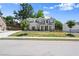 Charming two-story home features manicured lawn and attractive brick and siding exterior at 1620 Brook Ivy Dr, Lawrenceville, GA 30044