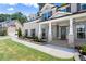 Charming brick home with a covered porch and well-maintained landscaping at 1620 Brook Ivy Dr, Lawrenceville, GA 30044