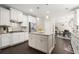 Open kitchen with granite countertops, an island, stainless steel appliances and eat-in dining at 1620 Brook Ivy Dr, Lawrenceville, GA 30044