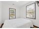 Bright bedroom with hardwood floors and two windows, offering a serene and comfortable space at 2776 Grand Ave, Atlanta, GA 30315