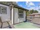 Exterior view of a home with a small deck and fenced yard, offering privacy and outdoor enjoyment at 2776 Grand Ave, Atlanta, GA 30315