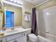 Bathroom featuring a vanity with sink, toilet, and shower-tub combo at 4221 Bretdale Nw Run, Kennesaw, GA 30152