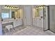 Bathroom with dual sinks, white cabinetry, a vanity, a toilet and a glass-enclosed shower at 4221 Bretdale Nw Run, Kennesaw, GA 30152