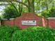 Amberwood community entrance sign surrounded by lush greenery at 4221 Bretdale Nw Run, Kennesaw, GA 30152
