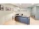 Cozy basement living area with stylish decor, wood floors, and tin ceiling at 8531 Lake Dr, Snellville, GA 30039