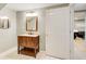 Bathroom featuring wood vanity with marble countertop and tiled floors at 8531 Lake Dr, Snellville, GA 30039