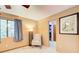 Bedroom featuring a comfortable chair, window with natural light, and doorway to closet at 8531 Lake Dr, Snellville, GA 30039