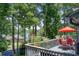 Outdoor deck area with scenic lake views, perfect for relaxation and outdoor dining at 8531 Lake Dr, Snellville, GA 30039