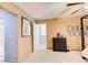 Bedroom showcases a four-poster bed, neutral walls, and a doorway leading to the en suite bathroom at 8531 Lake Dr, Snellville, GA 30039