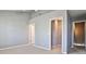 Bright bedroom with neutral walls, carpet, high ceilings, and two closets at 1126 Village Ct, Atlanta, GA 30316