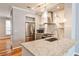 Open concept kitchen featuring stainless steel appliances and granite countertops at 1126 Village Ct, Atlanta, GA 30316