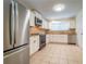 Updated kitchen featuring stainless steel appliances, granite countertops, and plenty of cabinet space for storage at 3677 Blackshear Ct, Duluth, GA 30096