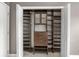 Walk-in closet with custom shelving and drawers for optimal organization at 6980 Roswell Rd # N5, Atlanta, GA 30328