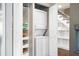 Convenient in-unit stacked washer and dryer nestled in a closet for efficient use of space at 6980 Roswell Rd # N5, Atlanta, GA 30328