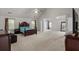 Main bedroom with high ceilings, carpet and a large layout at 802 Cormac Dr, Riverdale, GA 30296