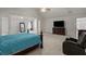 Large main bedroom with a high ceiling and a neutral color scheme at 802 Cormac Dr, Riverdale, GA 30296