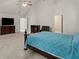 Spacious bedroom featuring high vaulted ceilings, large furniture, and a cozy king bed at 802 Cormac Dr, Riverdale, GA 30296