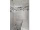 Close-up of the tiled shower with marble accents and built-in shelving at 802 Cormac Dr, Riverdale, GA 30296