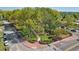 Overhead shot showcases a well-kept city green space bordered by busy streets at 171 Riverview Trl, Roswell, GA 30075