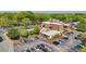 Aerial view of a property showcasing ample parking and surrounding greenery at 171 Riverview Trl, Roswell, GA 30075