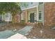 Charming brick and siding home with a well-maintained front yard and welcoming entrance at 171 Riverview Trl, Roswell, GA 30075