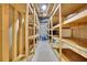Basement features a large open space and unfinished shelving at 8935 Muirfield Ct, Duluth, GA 30097