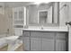 Bathroom with a single sink vanity, tile flooring, and shower/tub combination at 8935 Muirfield Ct, Duluth, GA 30097