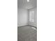 Bedroom featuring natural light and plush carpeting at 250 Shawnee Trl, Dallas, GA 30157