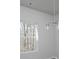 Bright living space with a window view and a modern chandelier at 250 Shawnee Trl, Dallas, GA 30157