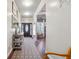 Hallway with decor and a decorative rug leading to the front door at 1369 Sierra Ridge Pl, Loganville, GA 30052