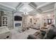 A comfy living room includes sofas, a fireplace, and stylish decor at 1369 Sierra Ridge Pl, Loganville, GA 30052