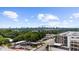 A distant aerial view showing the Atlanta skyline with surrounding buildings and businesses at 1822 N Rock Springs Ne Rd # 24, Atlanta, GA 30324
